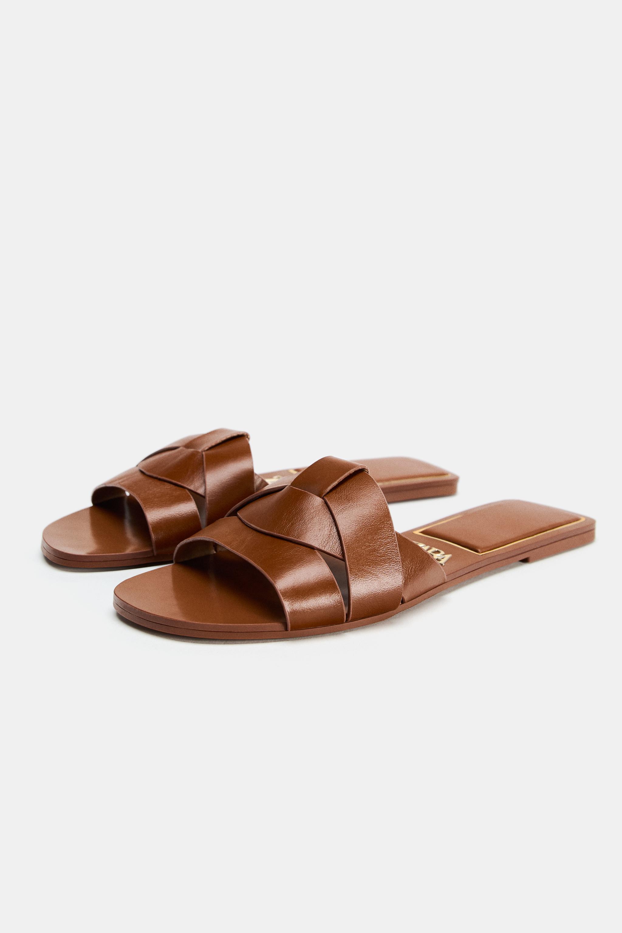FLAT CROSSED LEATHER SANDALS